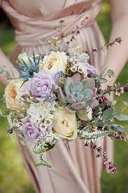 This beautiful bouquet contains blue flowers, purple flowers, greens and fillers. 86 Purple And Green Bouquets Ideas Wedding Wedding Flowers Purple Wedding