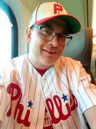 Zack Baun arrives in Kansas City wearing a Phillies shirt