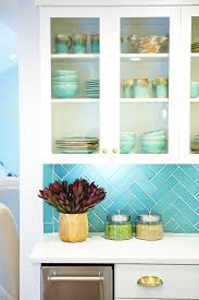 12 Ways To Brighten A Kitchen When It S Starved Of Natural Light In 2020 Turquoise Tile Teal Kitchen Home Decor Kitchen