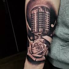 A stunning tattoo design that you are sure to love. Vintage Microphone And Rose Piece Minor Ink Tattoos
