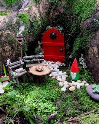 Glowing watering can made with fairy lights! 25 Diy Fairy Garden Ideas How To Make A Miniature Fairy Garden