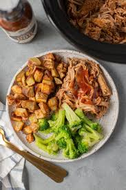 Then it is left in the fridge overnight to soak in its marinade and then slow cooked over the potatoes the next day on low. Crockpot Pulled Pork Recipe Healthy The Clean Eating Couple