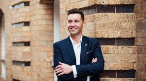 Who is Aaron Woolard?