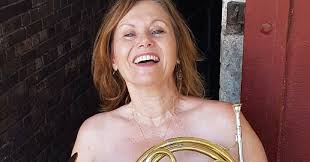 Lisa Conlan-Holownia plays French Horn solo at the Sinfonia's Legends  concert.