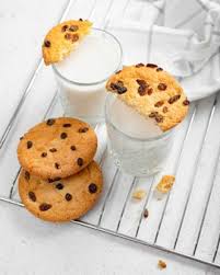 Flaky, buttery biscuits are the best, and we wish we could eat them every day. Premium Photo Homemade Pastries Round Large Raisin Biscuits Treats For Children Desserts Made From Natural Products Cookies And Milk