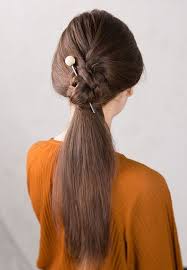 Fun Hair Stick Style Hairstyles For Long Hair A Braid Wrapped Ponytail Hairstyle Secured With A Beautifu Hair Sticks Patriotic Hair Accessories Metallic Hair