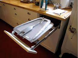 In the process of making the ironing board on wheels. Laundry Room 8 Ideas To Conceal An Ironing Board Tip Junkie