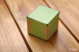 Once the whole thing is cut out, you will be able to fold and then secure the right places to form a cube. How To Make A Paper Cube