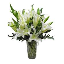 Fromyouflowers uses the freshest lilies to create stunning flower bouquets for your loved ones. Funeral Arrangements White Lily Bouquet Cathy Cowgill Flowers