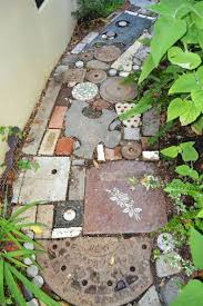 Choose a paving stone that contrasts with your house bricks and build in a planting area to separate your car parking space from the pathway. Beautiful Photos Of Creative And Colorful Vegetable Gardens Diy Garden Path Diy Garden Paths And Walkways Garden Path Diy