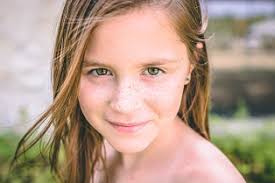 Girl, wind, eyes, closed, freckles, blonde by Candice Cason. Photo stock