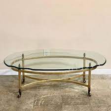 Hoop cantilevered low cocktail table by j. Sasha Round Brass Coffee Table With Oval Glass Top Chloe S Vintage
