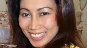 John Chardon 'smiling' as he is charged over wife Novy's murder