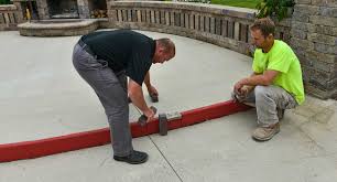Use a mallet to secure each paver in place, and check each paver for level before how to upgrade a concrete urban patio. Installing Pavers On Concrete Unilock