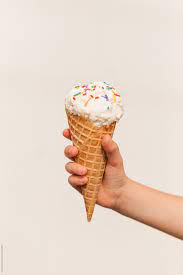 These feature chocolate ice cream encased in a solid chocolate shell. Child S Hand Holding An Ice Cream Cone With Sprinkles Against A White Background By Amanda Worrall