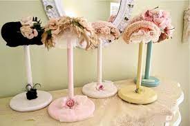 The Polka Dot Closet More Paper Towel Holder Hat Stands Diy Hat Stand Hat Display Ideas Hat Stands