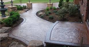 Brown Stamped Concrete Driveway The Concrete Network Front Yard Landscaping Stamped Concrete Patio Backyard Landscaping