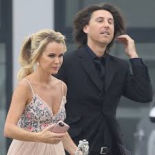 The presenter has given a candid insight into their romantic life. Amanda Holden Stuns In Backless Summer Dress As She Joins Flower Girl And Bridesmaid Daughters At Friend S Wedding Irish Mirror Online