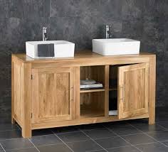 With a broad selection of drawer base vanities, you can create an exquisite bath design for a bathroom of any size. Alta Solid Oak Extra Large 130cm Double Basin Vanity