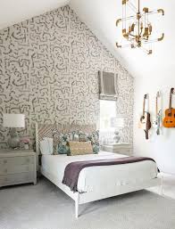 Typically, the bed is the largest piece of bedroom furniture and should be placed first when considering your bedroom layout. Bedroom With One Nightstand Design Ideas