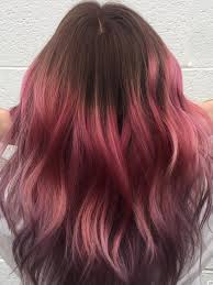 A nice dark shadowed root fading into a lighter pink. The Key To Perfect Pink Hair Color Don T Bleach The Roots Allure