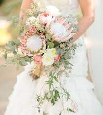 Spring has sprung — so it's time to get outside and embrace it! Glamorous Palm Springs Wedding Meg Scott Spring Wedding Bouquets Wedding Flowers Protea Wedding