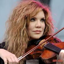 His hair is white, he has wrinkles