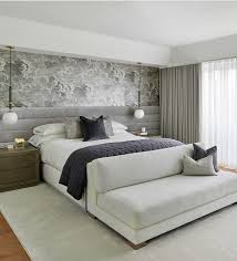 Purchasing a grey upholstered queen bed assures you of getting this ambiance in your room. Modern Monochromatic Grey Bedroom Decor With Extended Headboard Grey Bedroom Decor Bedroom Bed Design Modern Bedroom Decor