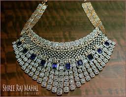 A Sumptuous Diamond Necklace With Incredible Invisible Settings Along With Sparkling Blue Stone Creates Bridal Bauble That Defies Traditional Yet Contemporary L