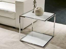 Impromptu dining table, home theater, drink holder, footrest, and, of course, display area for your art books. One Glass Coffee Table By Pacini Cappellini Design Elena Vigano