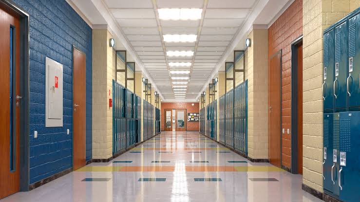 What's the difference between lockdown and secure status in schools?