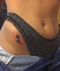 This cute small diving tattoo is the ideal design for someone who likes to go deep in all aspects of life. Get Hip Tattoos For Women Small Background