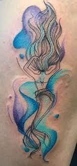 The use of bold colors appears incredibly graceful and wearing the watercolor mermaid tattoo can surely make you feel like one ecstatic beauty which can anyone kill with one look. Watercolor Mermaid Tattoo Watercolor Mermaid Tattoo Mermaid Tattoo Designs Mermaid Sleeve Tattoos