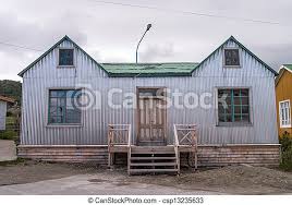 Provides a fantastic barrier between the wooden walls and dark flooring. House With Corrugated Metal Wall Canstock