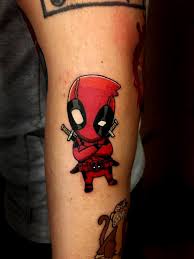 Some people will always prefer keeping things simple when it comes to tattooing, but this does not mean that they cannot have a stylish and for the deadpool totem, the simplest design variation entails drawing his logo which is just the round red head with two large black eyes. Pin On Marvel