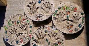 How To Make Stepping Stones Using A Child S Handprint Hunker Childs Handprint Crafts Crafts For Kids