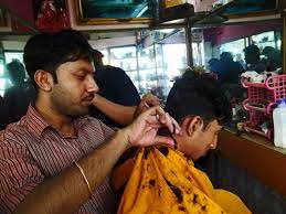 Local mandates impacting salon operations vary. Stock Pictures Indian Hair Stylists At Work In Small Salons
