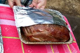 Wrapping the pork tenderloin with bacon is actually really simple, even though it may look fancy and learn how to make a bacon wrapped pork tenderloin. Wrapping Foil Around A Pork Roast For A Smoker Stock Photo Picture And Royalty Free Image Image 31435616