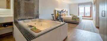 Hotel rooms with modern amenities. Biohotel Organic Suites S Junior Suite With Jacuzzi