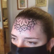 Image result for forehead tattoo