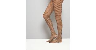 Maybe you would like to learn more about one of these? Gold Fishnet Tights New Look
