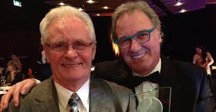 Don Kendall and Noel Turner holding their award for Contribution to the  Industry