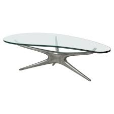 Natural pictured, ebony, or lacquer. Vladimir Kagan Cast Aluminum 412 Sculpted Coffee Table With Clear Glass Top For Sale At 1stdibs