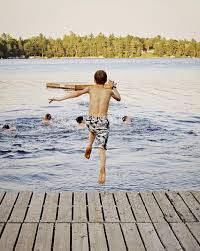 Boy Jumping Into Lake A 12 Year Boy Jumps Off A Dock Into Lake At Summer Camp Aff Year Lake Boy Jumping Summer Ad Lake Summer Camp Stock Photos