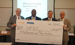 TaylorOswald (VOYA Foundation) presents $50,000 check to OFIC — OFIC
