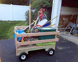 Made of common 2x4 lumber, plywood, glue, screws and large caster wheels. How To Make A Wagon Wooden Garden Cart Construction
