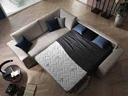 Divano letto chesterfield con struttura in legno massiccio di pioppo e cuscini sedile in vera piuma d'oca bianca con inserto in polilatex. Divano Ad Angolo Con Letto E Materasso Vari Colori