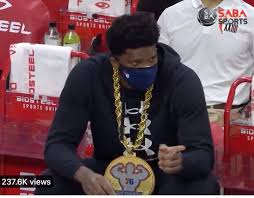 After one year of college basketball with the kansas jayhawks. Joel Embiid Rocks Massive Big Energy Chain On Sideline