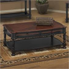 .the hamlyn accent table collection uses a warm medium brown finish and classic details adorning each table to create beautiful traditional style that fits perfectly into any living room. 03 0020 50 611 New Classic Furniture Jamaica Cocktail Table