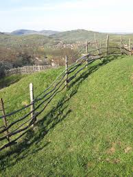 Equestrian friendly fencing whitewashed wood split rail fence is the traditional look for equestrian homesites, but this material is rife with problems and high maintenance. File Timber Fence And View Over MihÄƒesti Arges Jpg Wikimedia Commons
